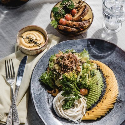 Fresh healthy salad with mango and avocado at Life Cafe